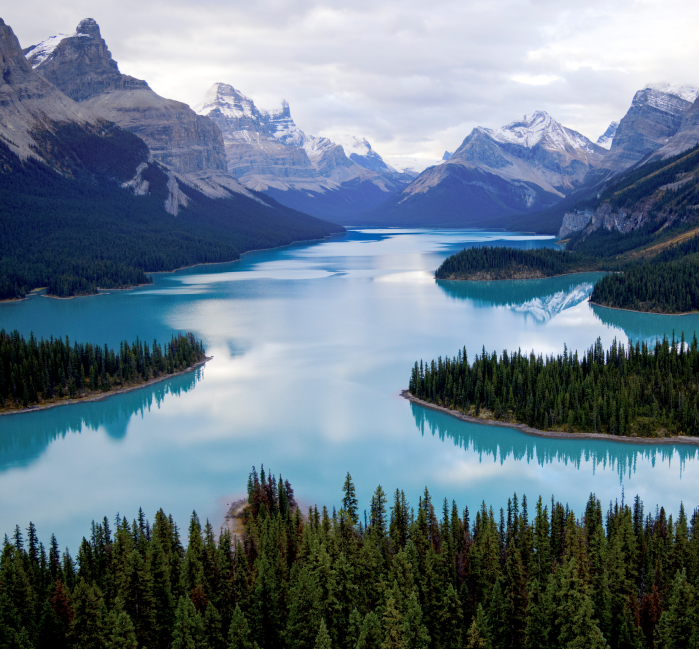 View of guest on FlyOver ride shows spherical screen and legs hanging from chairs