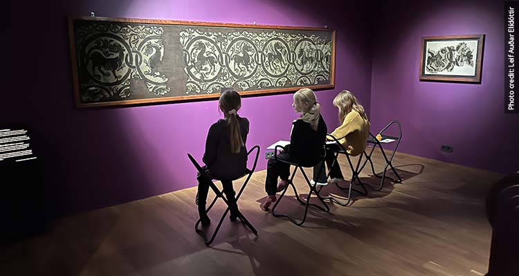 Women viewing art at the National Museum of Iceland